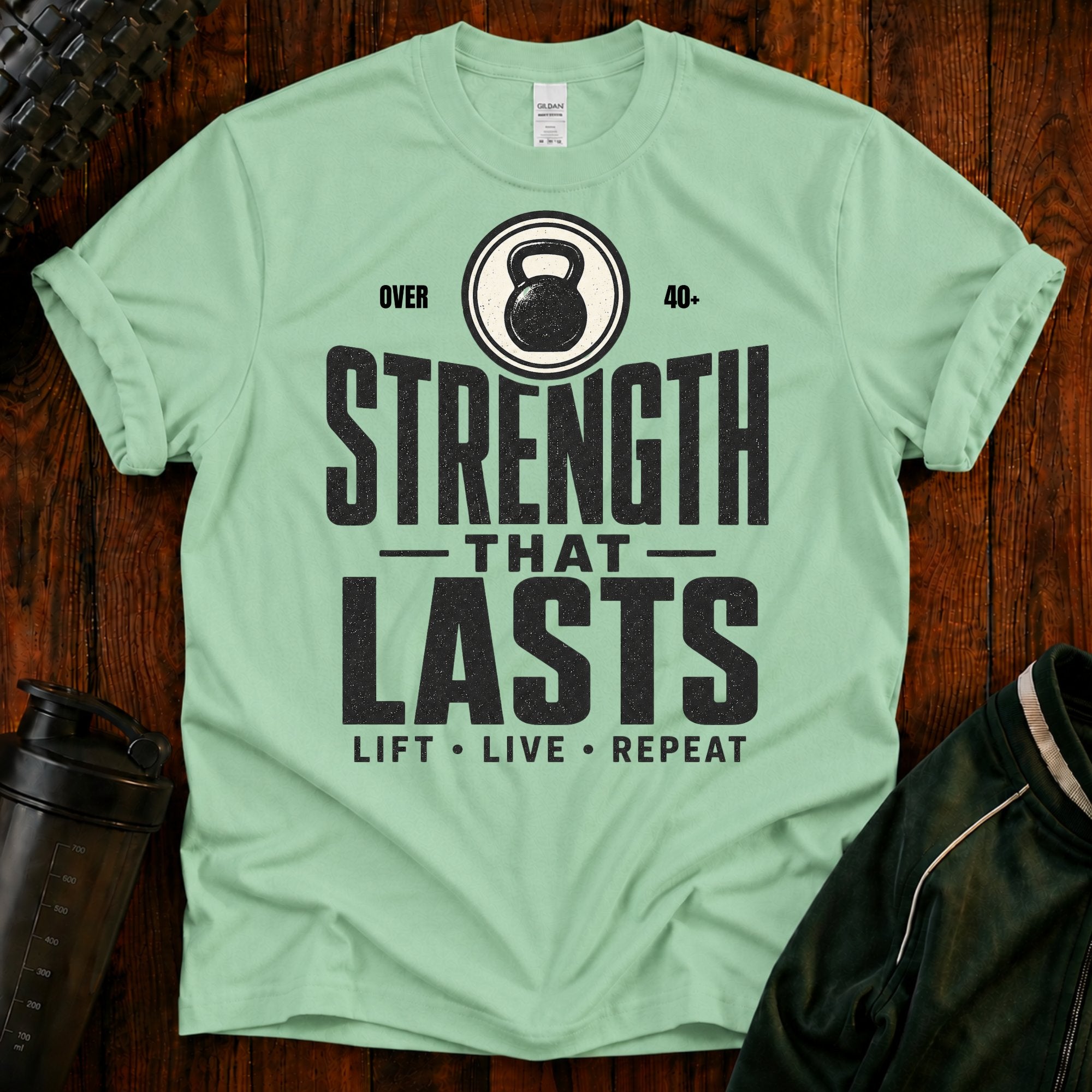 Strength That Lasts T‑Shirt — Over 40 Kettlebell Fitness Tee