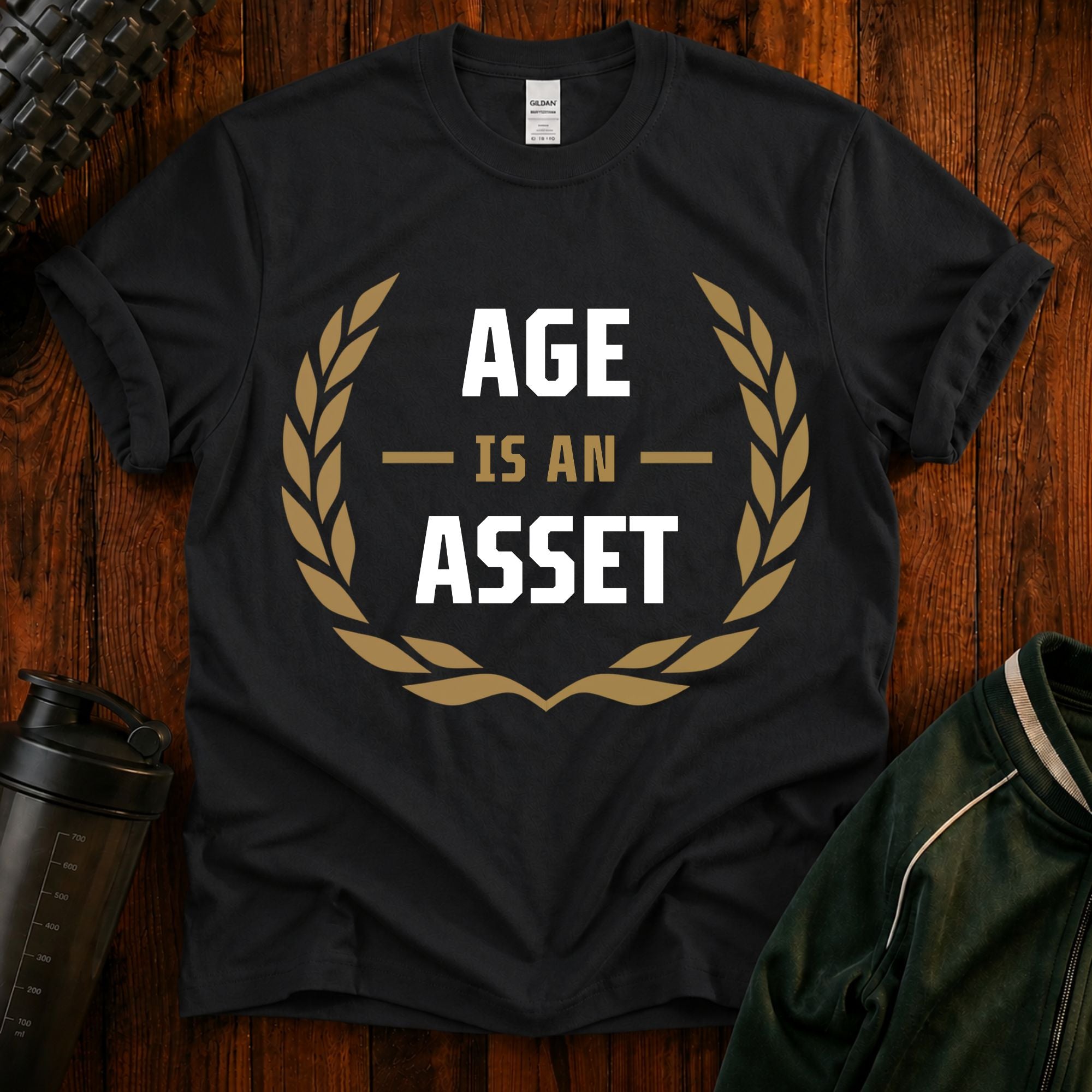 Age Is an Asset Fit After 40 graphic t-shirt celebrating healthy aging and lifelong fitness.