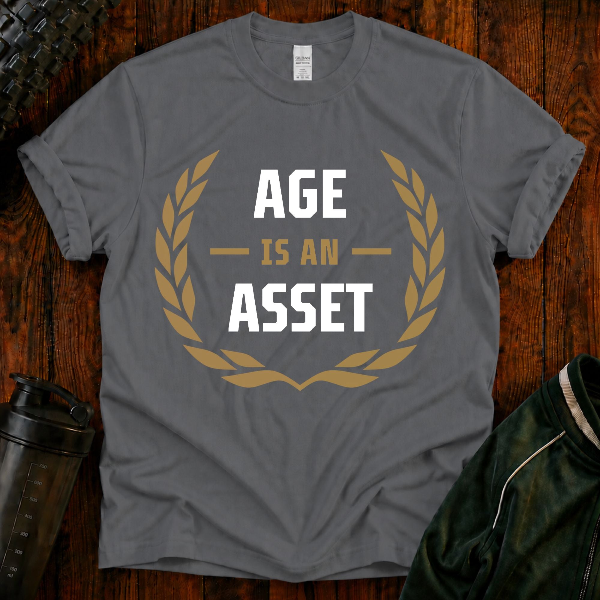 Age Is an Asset Fit After 40 graphic t-shirt celebrating healthy aging and lifelong fitness.