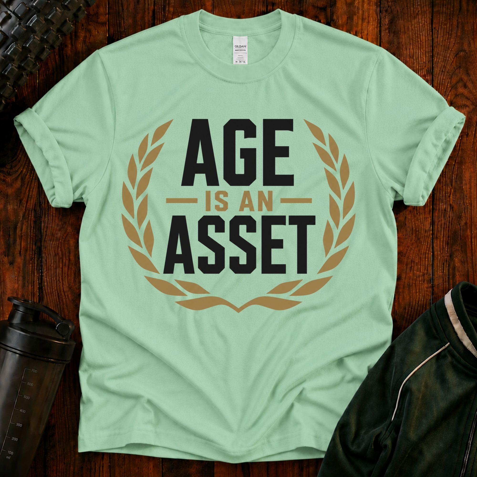 Age Is an Asset Fit After 40 graphic t-shirt celebrating healthy aging and lifelong fitness.
