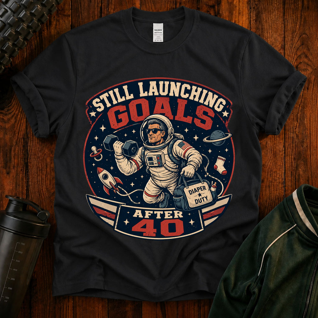 T-Shirt — "Still Launching Goals After 40" Astronaut Graphic Tee