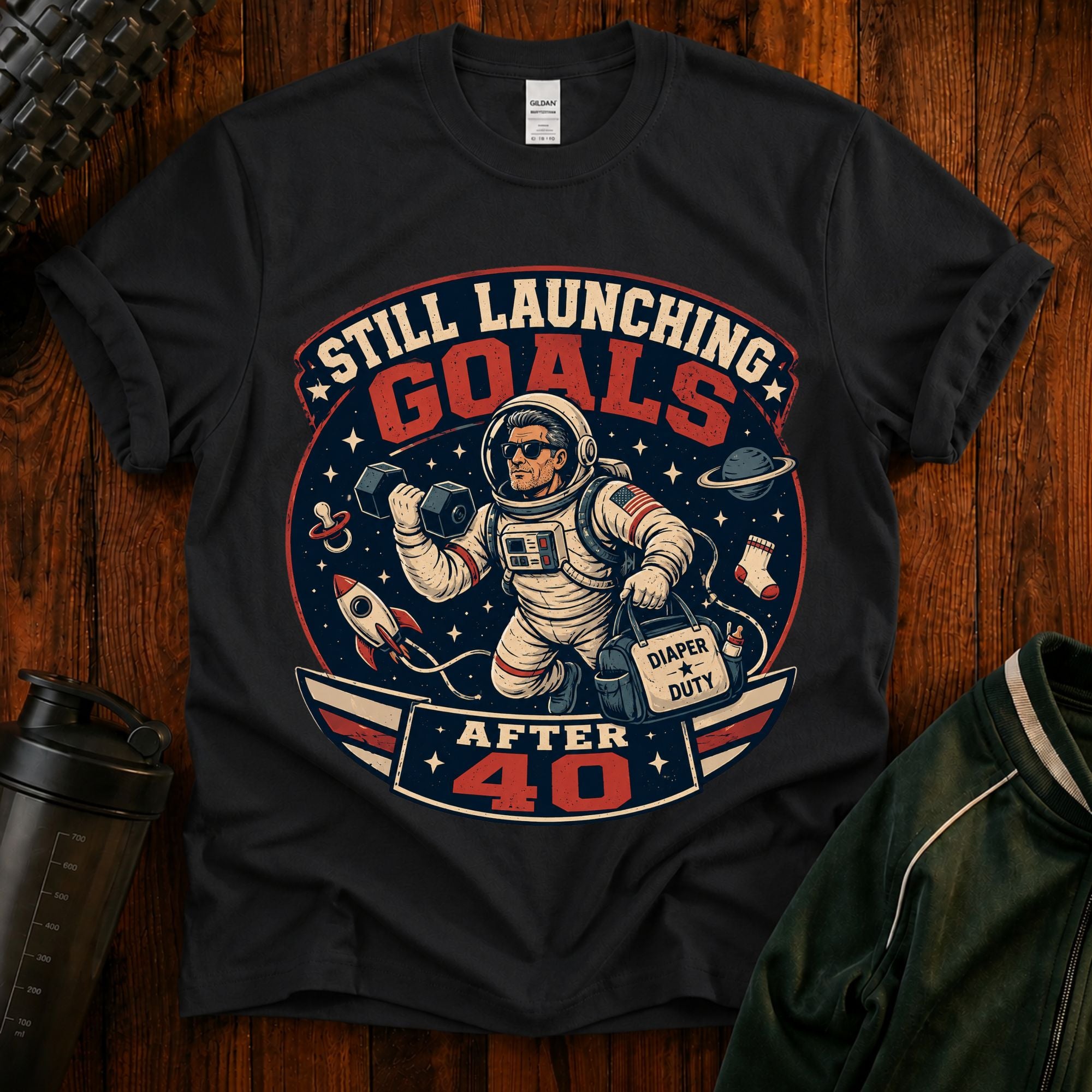 T-Shirt — "Still Launching Goals After 40" Astronaut Graphic Tee