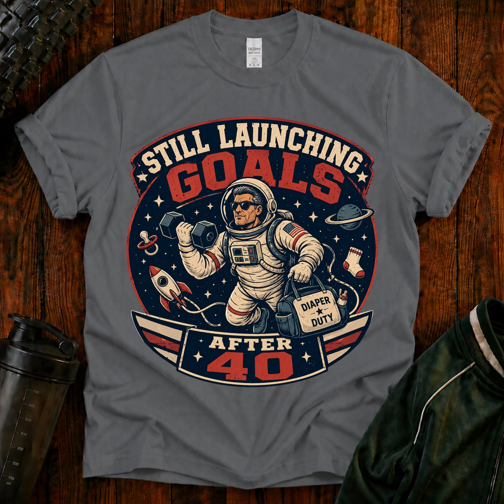 T-Shirt — "Still Launching Goals After 40" Astronaut Graphic Tee