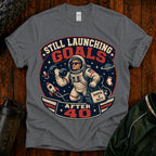 T-Shirt — "Still Launching Goals After 40" Astronaut Graphic Tee