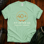 Fit After 40 Shirt featuring Grace Grit Strength design on a mint green premium cotton t-shirt.