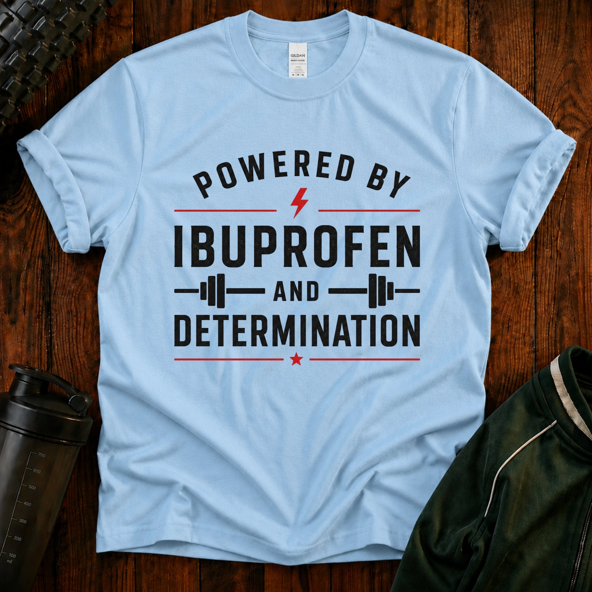T-Shirt — "Powered by Ibuprofen" Funny Gym & Recovery Tee