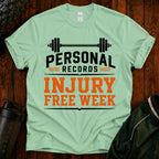 Personal Records T‑Shirt — 'Injury Free Week' Weightlifting Gym Tee