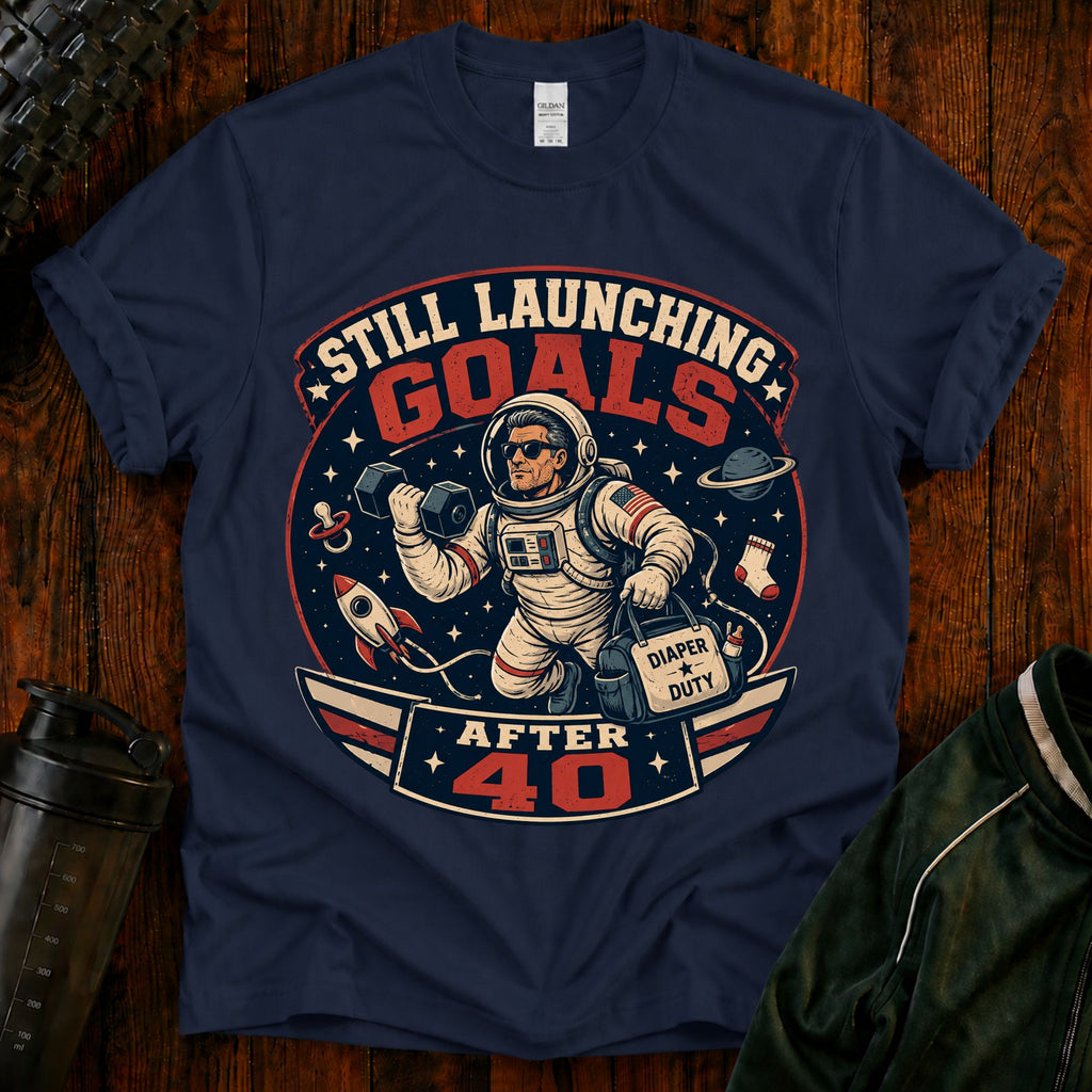 T-Shirt — "Still Launching Goals After 40" Astronaut Graphic Tee