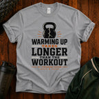 Funny Workout T‑Shirt — "Warming Up Takes Longer Than The Workout