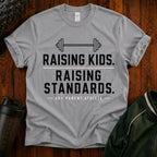 Raising Kids. Raising Standards. T‑Shirt — Funny Parenting Fitness Tee