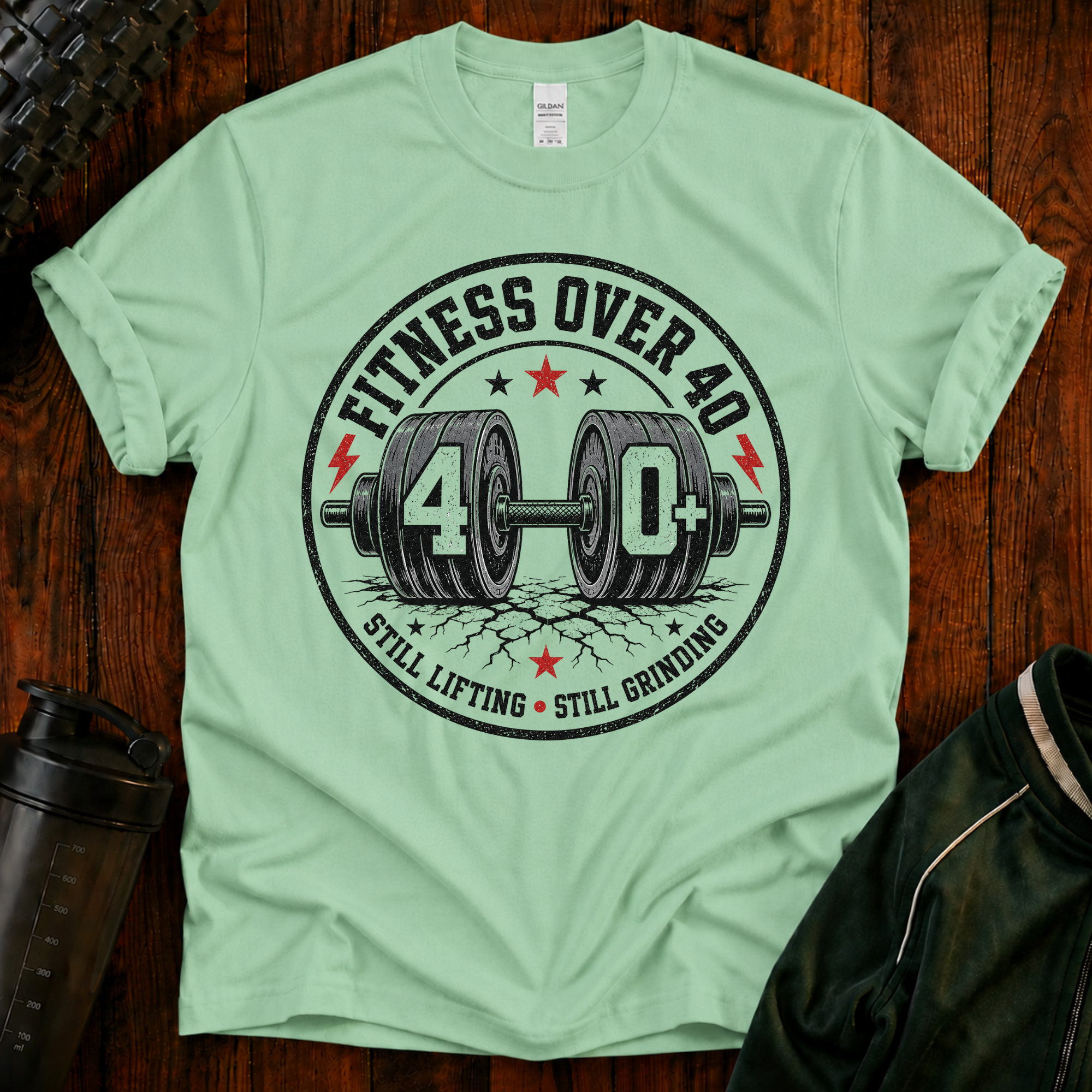 Still Lifting Still Grinding Fitness Over 40 graphic t-shirt for active adults over 40.