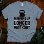 Funny Workout T‑Shirt — "Warming Up Takes Longer Than The Workout