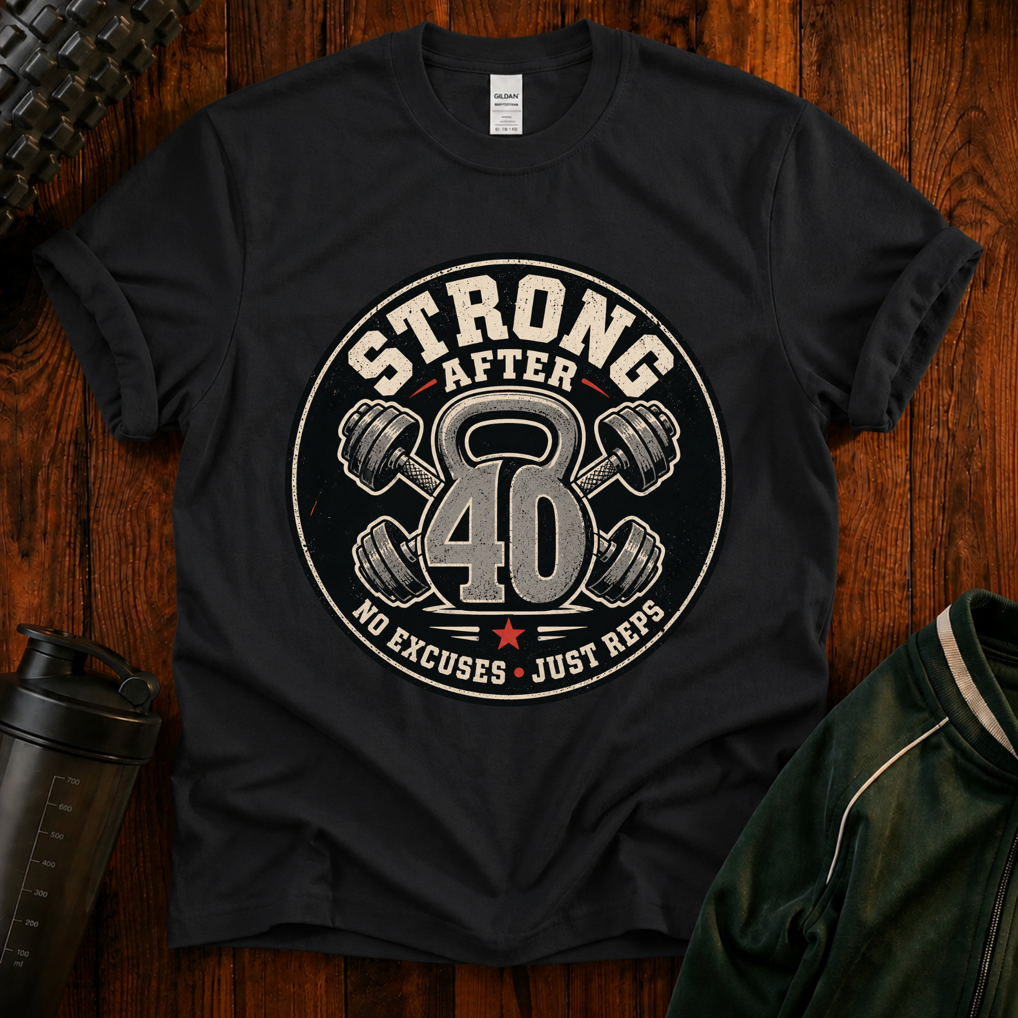 Strong After 40 graphic fitness shirt with kettlebell and dumbbells for active adults over 40.