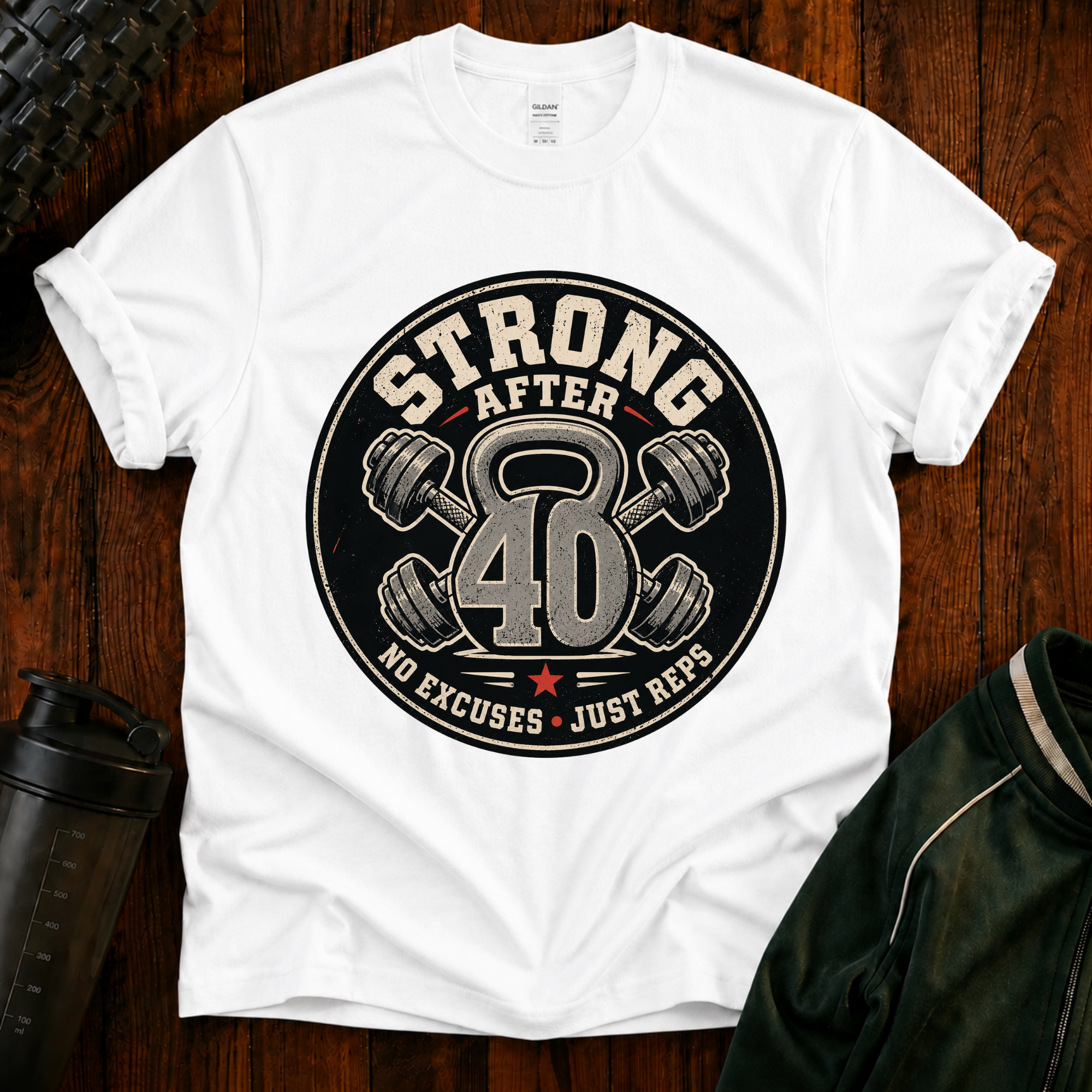 Strong After 40 graphic fitness shirt with kettlebell and dumbbells for active adults over 40.
